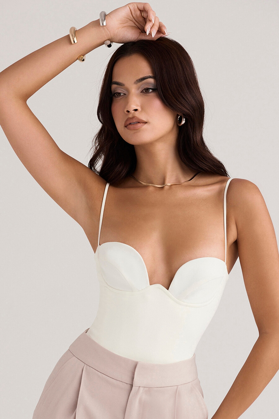 body con ferretto color avorio